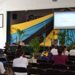 Carlton Adderley, Assistant Operations Manager/HR Administrator of Colina General Insurance Agents & Brokers Ltd. addressing individuals who attended the Post-storm Advisory Clinic for those affected by Hurricane Dorian. The event was held at the Geoffrey Brown Auditorium of the Queen’s College Campus on Village Road.